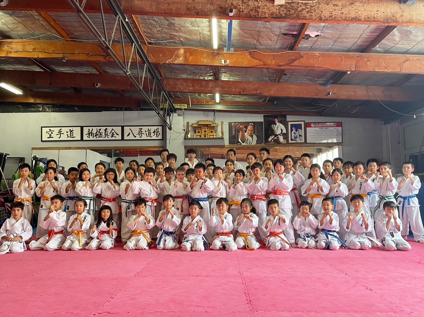 Students sparring in dojo